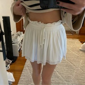 Princess Polly flowy white mini skirt (brand is Hazel sold by Princess Polly)
